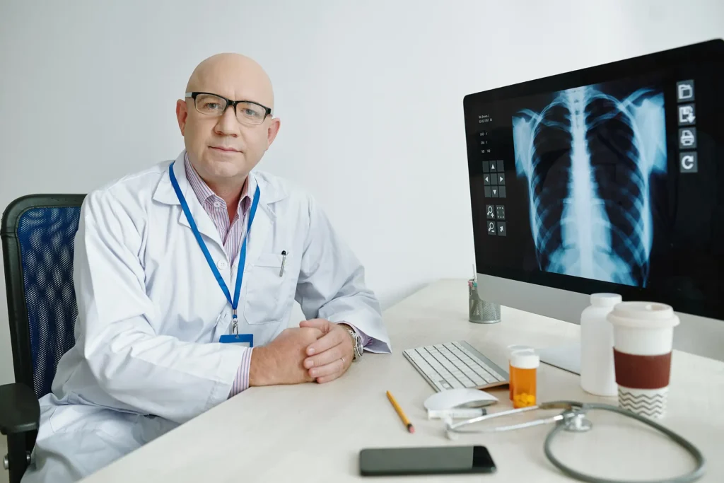 doctor viewing x-ray on screen